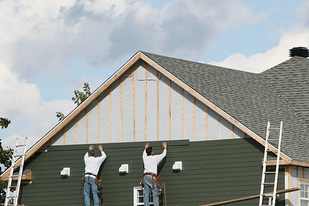 Professional Emergency Siding Repair technician working in Woodbury, NY
